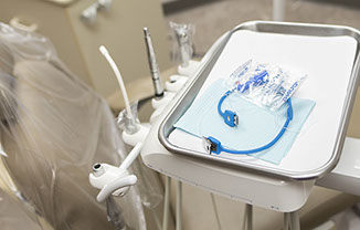 Photo of dental tools on tray in exam room